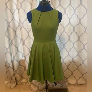 Green pleated strapless dress
